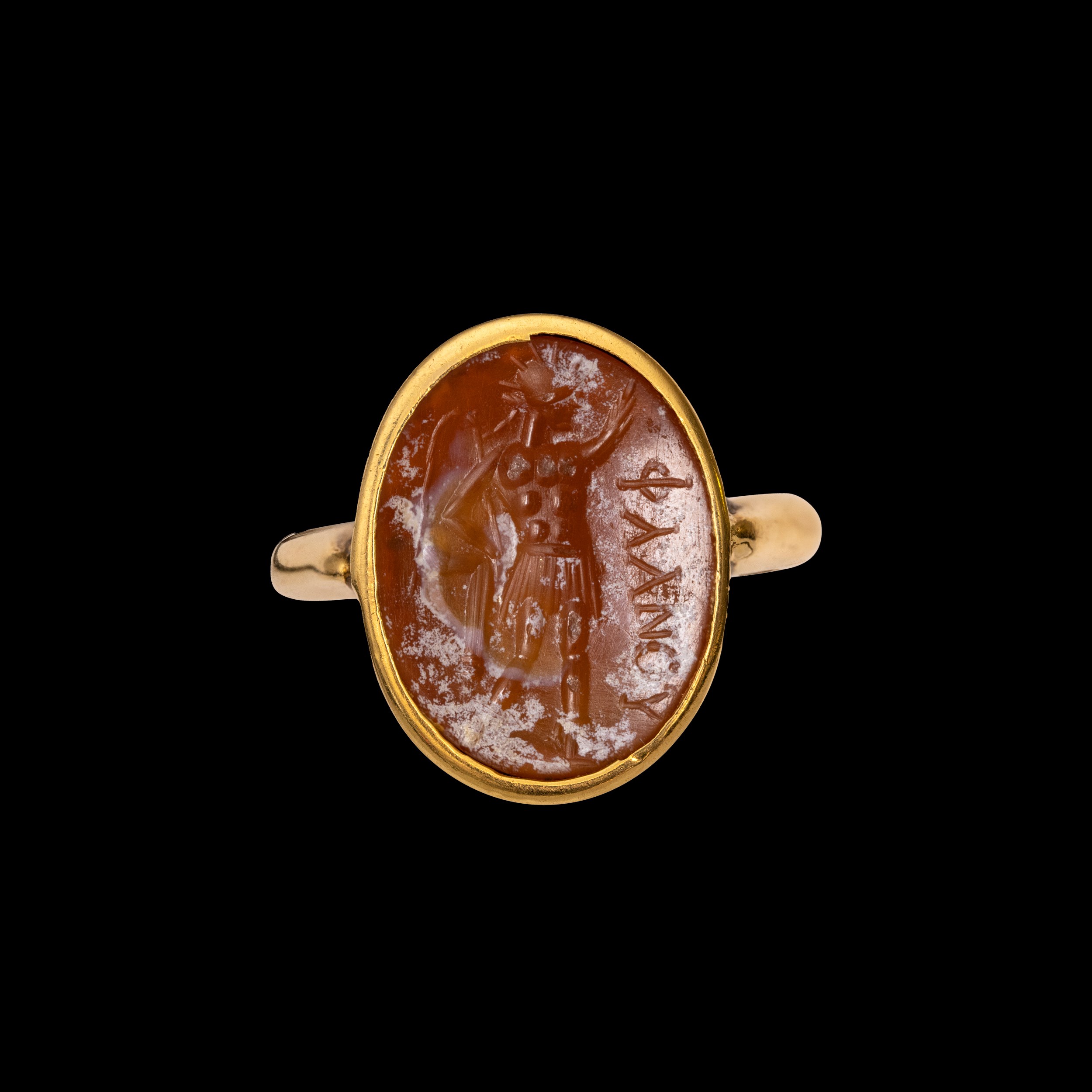 A gold ring set with a Roman carnelian intaglio. Sol Invictus.